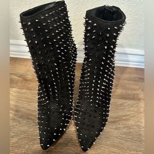 Steve Madden high heeled spike booties.